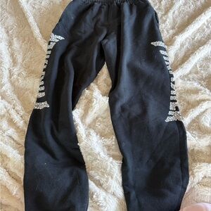 Thrasher Black Sweatpants with Striped Accents